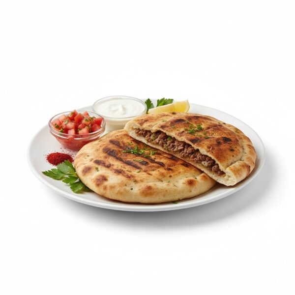 سندوتش حواوشي مشوي على الفحم بتتبيلة شرقية مميزة وطعم قوي من مطعم قوطه للمشويات.