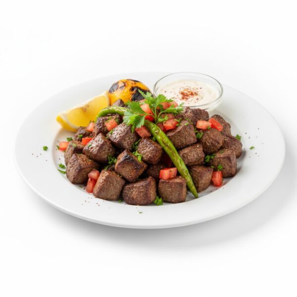 كبدة ضاني طازجة مشوية على الفحم بتتبيلة مميزة ونكهة مدخنة غنية، يقدمها قوطه للمشويات لعشاق الكبدة والمذاق العربي الأصيل.